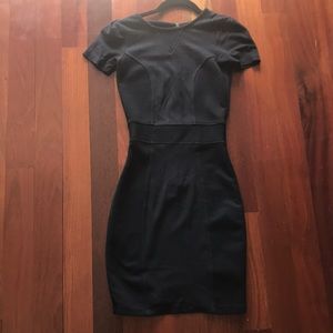 Size 2. Gently worn French Connection short sleeve navy blue dress.